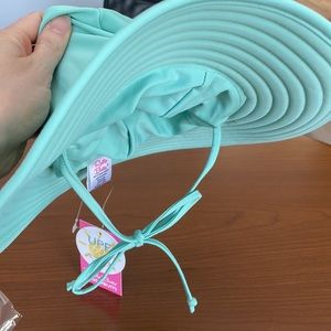 NWT RuffleButts swim hat in Sage